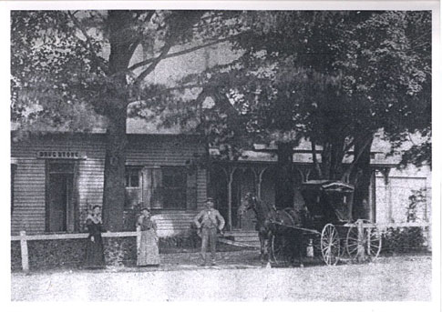 Dr. Frederick Cutter Sr.'s drug store adjacent to his house, at the intersection of Academy and Principale North (northeast corner).